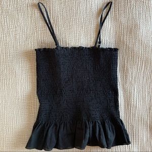 Anthropologie black smocked top
